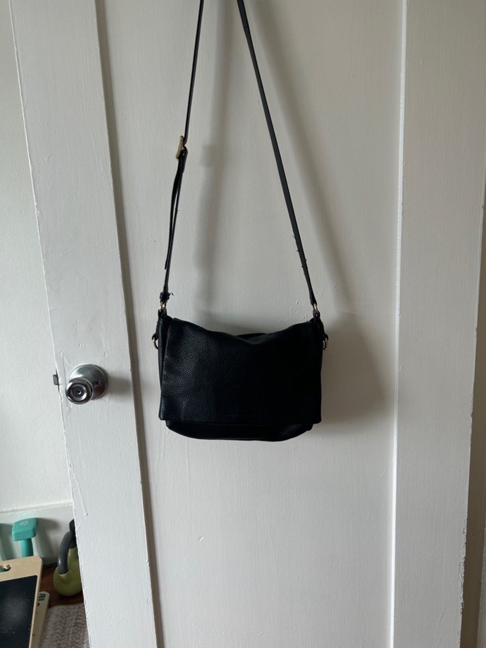 Black Crossbody leather purse.